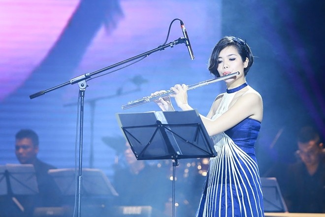 Seniwati seruling flute Le Thu Huong membawa  irama Viet Nam ke berbagai konser musik internasional - ảnh 1