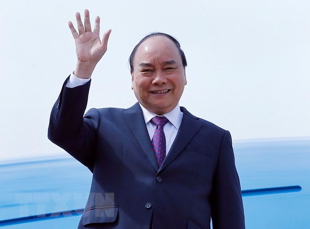 PM Nguyen Xuan Phuc tiba di Shanghai untuk memulai kehadiran dalam CIIE 2018 - ảnh 1