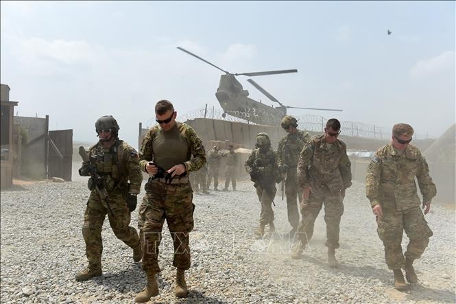 Presiden AS memutuskan menarik sebagaian  jumlah serdadunya dari Afghanistan - ảnh 1