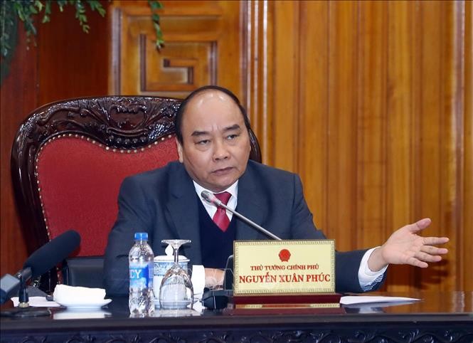 PM Nguyen Xuan Phuc menghadiri sidang mendorong pengembangan industri otomotif - ảnh 1