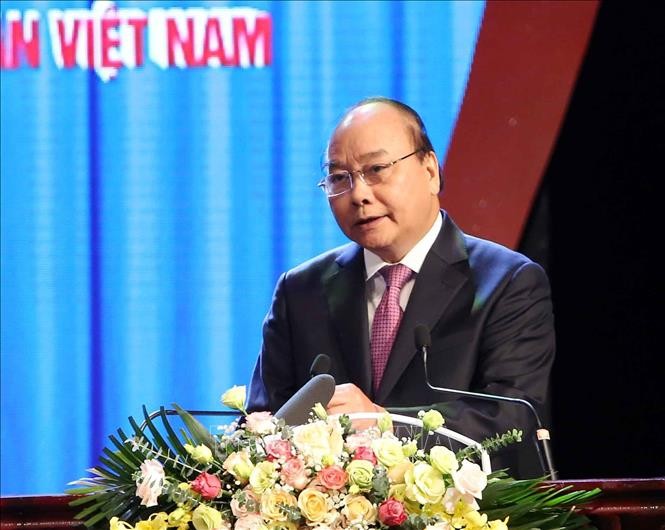 PM Nguyen Xuan Phuc: Terus membarui kuat isi dan cara aktivitas serikat buruh - ảnh 1