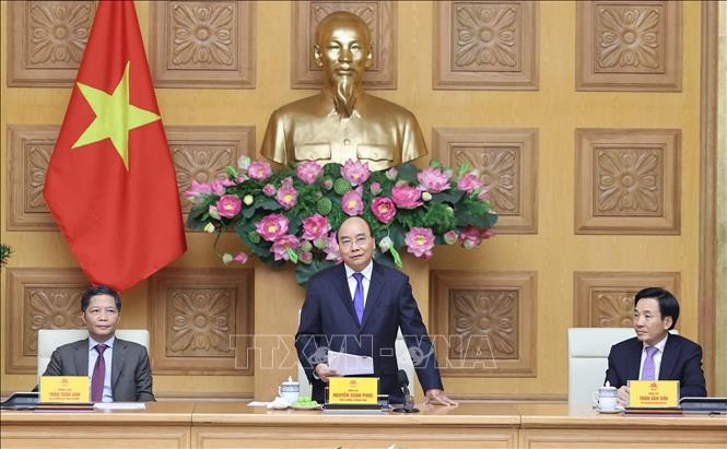 PM Nguyen Xuan Phuc Menerima Rombongan Badan Usaha yang Memiliki Produk yang Mencapai Brand Nasional 2020 - ảnh 1