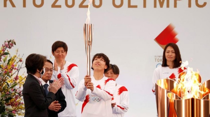 Jepang Buka Acara Pengarakan Obor Olimpiade Tokyo - ảnh 1