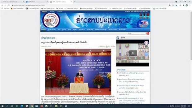 Koran Laos Meliput secara Menonjol Keberhasilan Pemilihan Anggota MN dan Anggota Dewan Rakyat di Viet Nam - ảnh 1