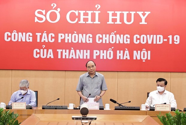 Presiden Nguyen Xuan Phuc: Dengan Dukungan Rakyat, Kita Pasti Menyukseskan Penanggulangan Wabah Covid-19 - ảnh 2