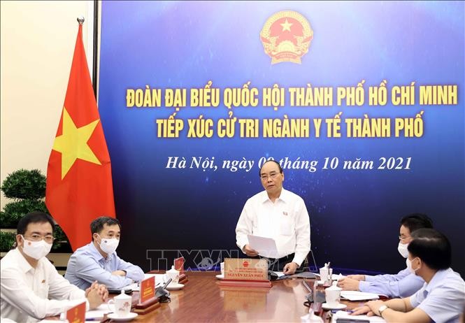 Presiden Nguyen Xuan Phuc Melakukan Kontak dengan Pemilih Kota Ho Chi Minh - ảnh 1