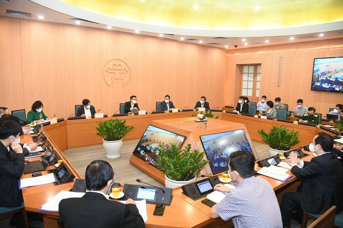 Deputi PM Vu Duc Dam Lakukan Temu Kerja dengan Kota Ha Noi tentang Pencegahan dan Penanggulangan Wabah Covid-19 - ảnh 1