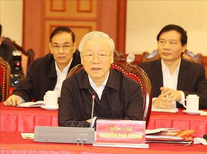 Sekjen Nguyen Phu Trong Pimpin Sidang Polit Biro KS PKV untuk Berlakukan Resolusi Pembangunan Ibukota Ha Noi Hingga 2030, Visi Hingga 2045 - ảnh 1