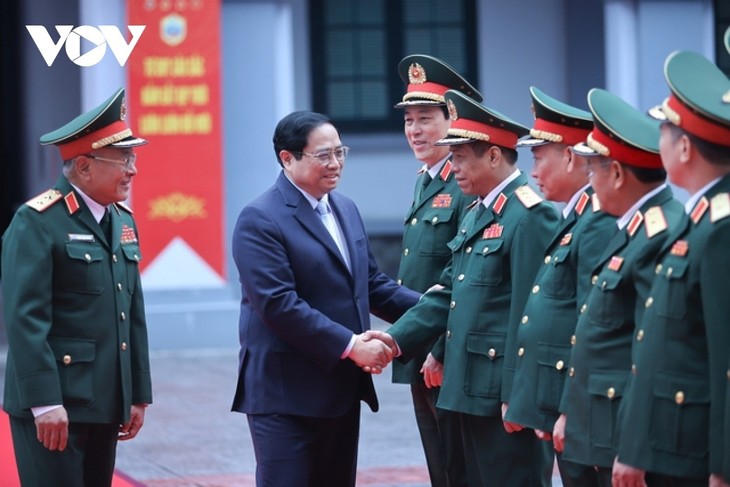 PM Vietnam, Pham Minh Chinh Kunjungi dan Sampaikan Ucapan Selamat Hari Raya Tet kepada Direktorat Jenderal II, Kemenhan Vietnam - ảnh 1