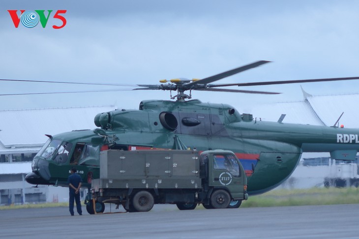ພິທີມອບຮັບເຮືອບິນເອລີກອບ​ເຕີ Mi -17 ຂອງລັດເຊຍ ໃຫ້ແກ່ກອງທັບອາກາດສປປລາວ - ảnh 6