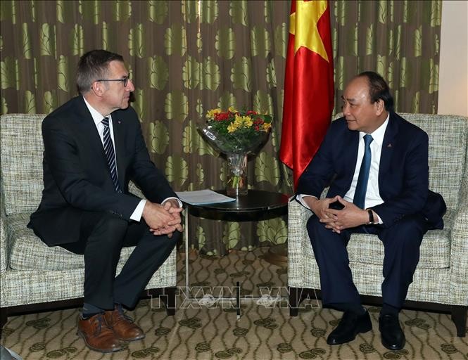 Premier vietnamita se reúne con el Rey y el ex canciller de Bélgica - ảnh 2