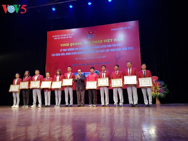 Enaltecen a los deportistas vietnamitas más destacados en 2018  - ảnh 1