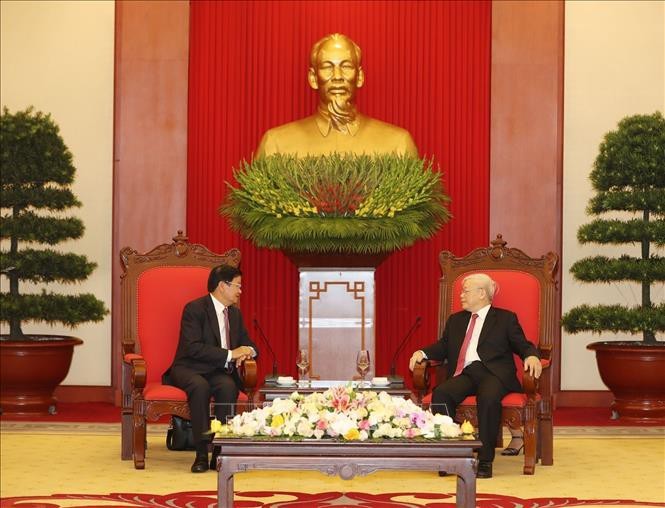 Máximo dirigente de Vietnam recibe al premier laosiano - ảnh 1