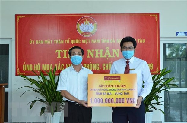 Vietnamitas aportan 210 millones de dólares para la compra de vacunas - ảnh 1