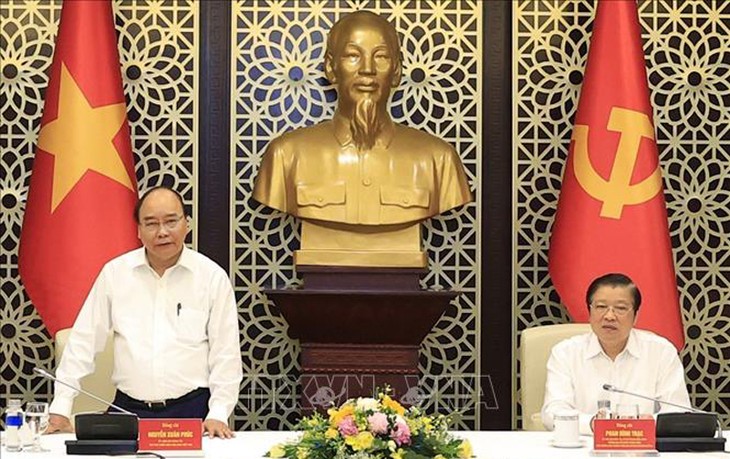 Presidente Nguyen Xuan Phuc pide el perfeccionamiento de la construcción de un Estado de derecho socialista - ảnh 1