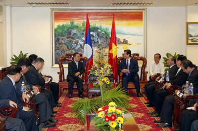 Sekjen Nguyen Phu Trong  dan PM Nguyen Tan Dung menerima Deputi PM, Menlu  Laos Thongloun Sisoulith - ảnh 2