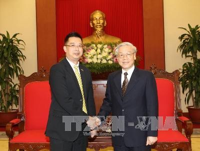 Sekjen  Nguyen Phu Trong menerima Dubes Singapura di Vietnam Simon Wong Wie Kuen - ảnh 1