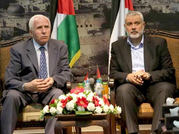 Palestina  setuju menghentikan masa 8 tahun perpecahan internal. - ảnh 1