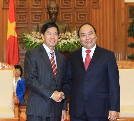 Deputi PM Nguyen Xuan Phuc  menerima  Walikota Vientiane-Laos - ảnh 1
