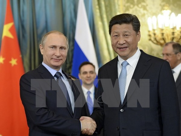 Rusia-Tiongkok mengeluarkan pernyataan bersama tentang kerjasama mengkonektivitaskan pembangunan persekutuan ekonomi Eropa-Asia - ảnh 1