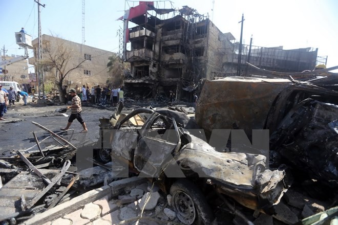 Serangan bom  bunuh diri menimbulkan banyak korban di Irak. - ảnh 1