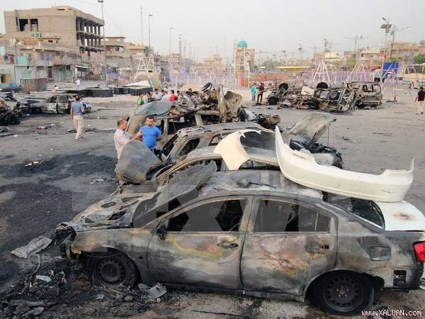 IS melakukan  serentetan serangan bom di Irak, membuat kira-kira 58 orang tewas - ảnh 1