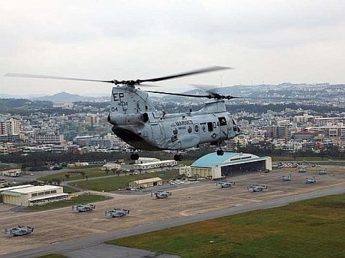 Jepang berbahas tentang rencana relokasi pangkalan militer AS di provinsi Okinawa - ảnh 1