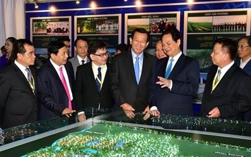 PM Vietnam, Nguyen Tan Dung menghadiri acara memulai pembangunan Proyek Zona Industri, Perkotaan dan Jasa VSIP Nghe An - ảnh 2