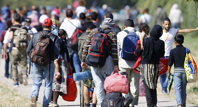 Uni Eropa  bertekat menangani krisis migran sampai ke akar-akarnya. - ảnh 1