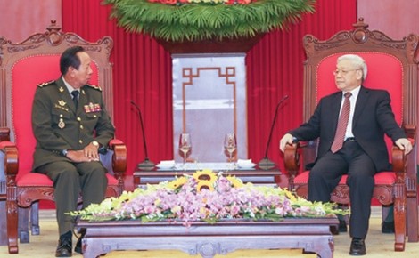 Sekjen KS PKV, Nguyen Phu Trong  menerima Menhan Kamboja, Tia Banh - ảnh 1