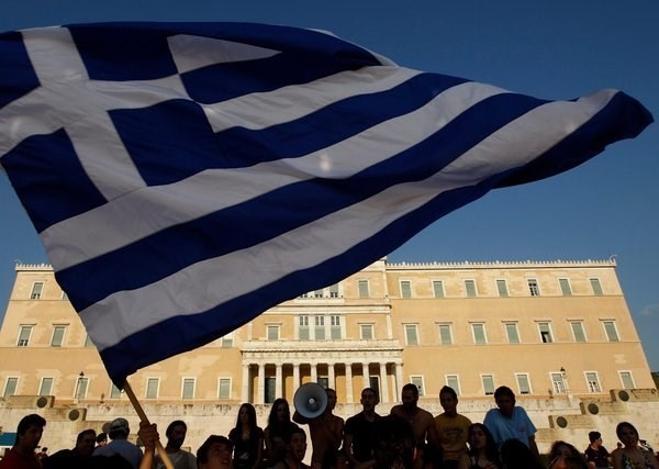 Yunani menyetujui peranan IMF dalam paket talangan ke-3 - ảnh 1