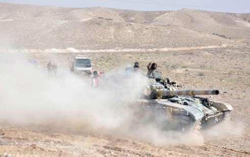 Tentara Suriah merebut kembali kontrol terhadap benteng kuno Palmyra dari tangan IS - ảnh 1