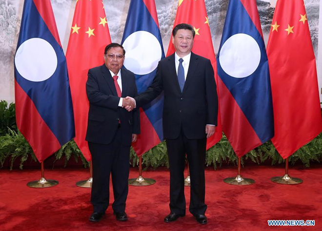 Tiongkok dan Laos memperkuat hubungan bilateral. - ảnh 1