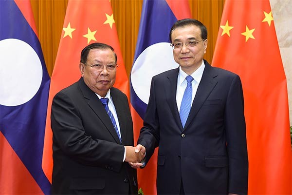 Tiongkok dan Laos  mendorong hubungan kemitraan strategis dan komprehensif - ảnh 1