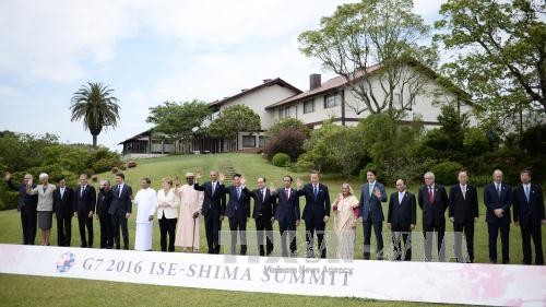 PM Vietnam, Nguyen Xuan Phuc mengakhiri dengan baik kunjungan  di Jepang dan kehadirannya pada KTT G-7 yang diperluas - ảnh 1