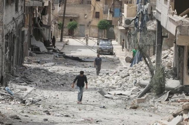 Suriah: Tentara dan  dan kekuatan pemberontak  setuju menghentikan kepungan terhadap  kota madya  di peluaran ibukota Damaskus - ảnh 1
