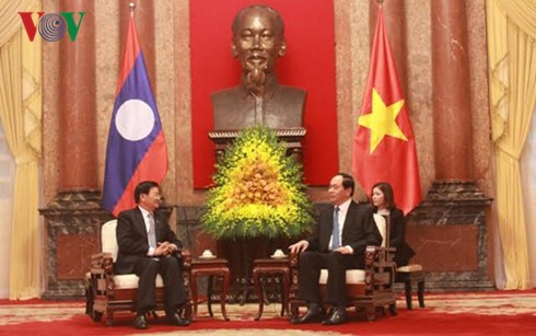 Presiden Vietnam, Tran Dai Quang menerima PM Laos, Thongloun Sisoulith - ảnh 1