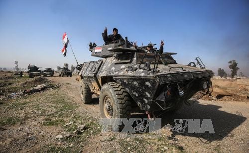 Pemerintah Irak memperkuat serangan terhadap IS di kota Mosul Barat - ảnh 1