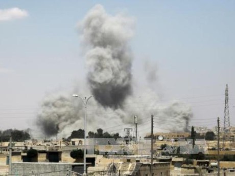 Pasukan koalisi pimpinan AS  menembak jatuh pesawat terbang tentara Suriah - ảnh 1