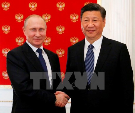 Presiden Rusia menyambut Presiden Tiongkok di Istana Kremlin - ảnh 1