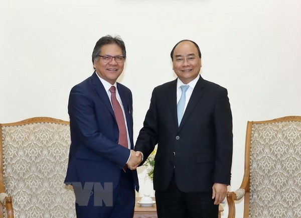 PM Viet Nam, Nguyen Xuan Phuc menrima Direktur Jenderal Badan Pengelolaan dan Penjaminan Efektivitas  Pemerintah Malaysia - ảnh 1