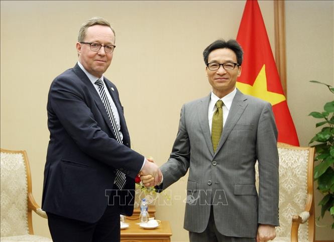 Deputi PM Viet Nam, Vu Duc Dam menerima Menteri Ekonomi Finlandia, Mika Tapani Lintila - ảnh 1