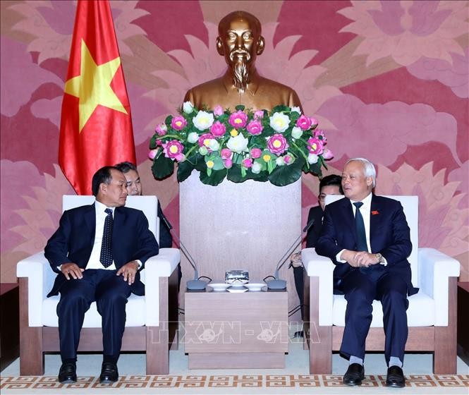 Wakil Ketua MN Viet Nam, Uong Chu Luu menerima Menteri Hukum Laos - ảnh 1
