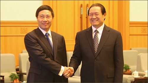 Rencontre entre Pham Binh Minh et Zhou Yongkang - ảnh 1