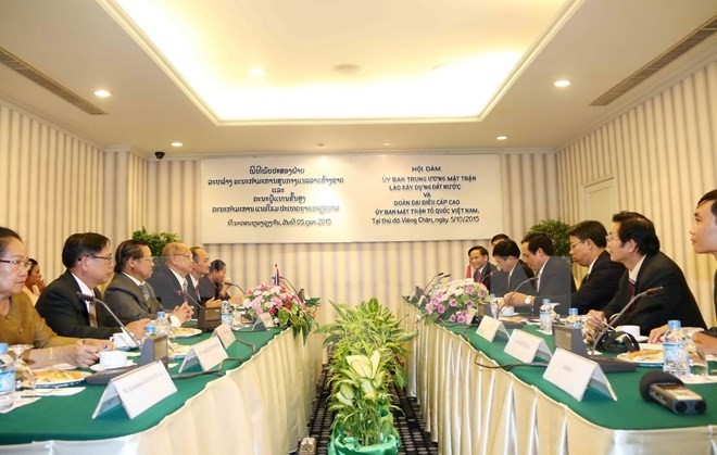 Vietnam, Laos enhance cooperation in ethnicity, religion - ảnh 1
