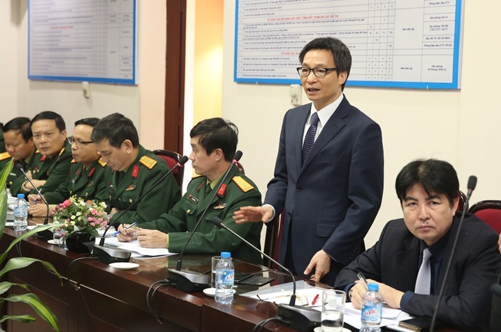 Deputy PM Vu Duc Dam works with People’s Army newspaper - ảnh 1