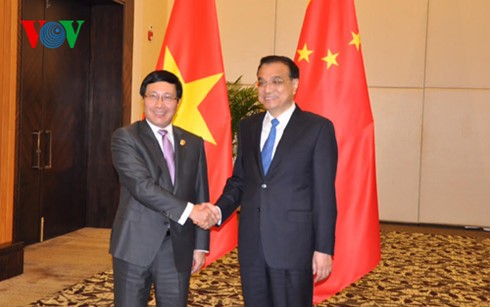 Deputy PM Pham Binh Minh meets Chinese Premier, Russian Deputy PM - ảnh 1