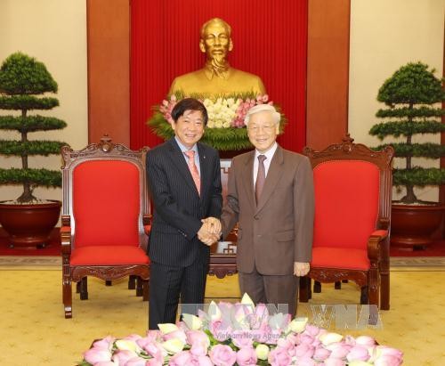 Le président du Parti d'action populaire de Singapour reçu par des hauts dirigeants vietnamiens - ảnh 1