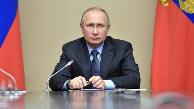 Présidentielle russe: Poutine largement en tête des sondages - ảnh 1