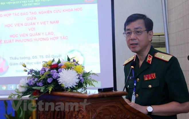 Viet Nam dan Laos memperkuat  kerjasama di bidang ilmu kedokteran militer - ảnh 1